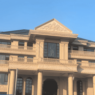 宜昌黄金麻别墅外墙干挂石材效果示例