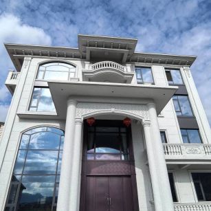 宜昌白麻别墅外墙干挂石材效果示例